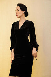 Velvet midi dress with V-neckline and gathered puff sleeves for elegant evening occasions